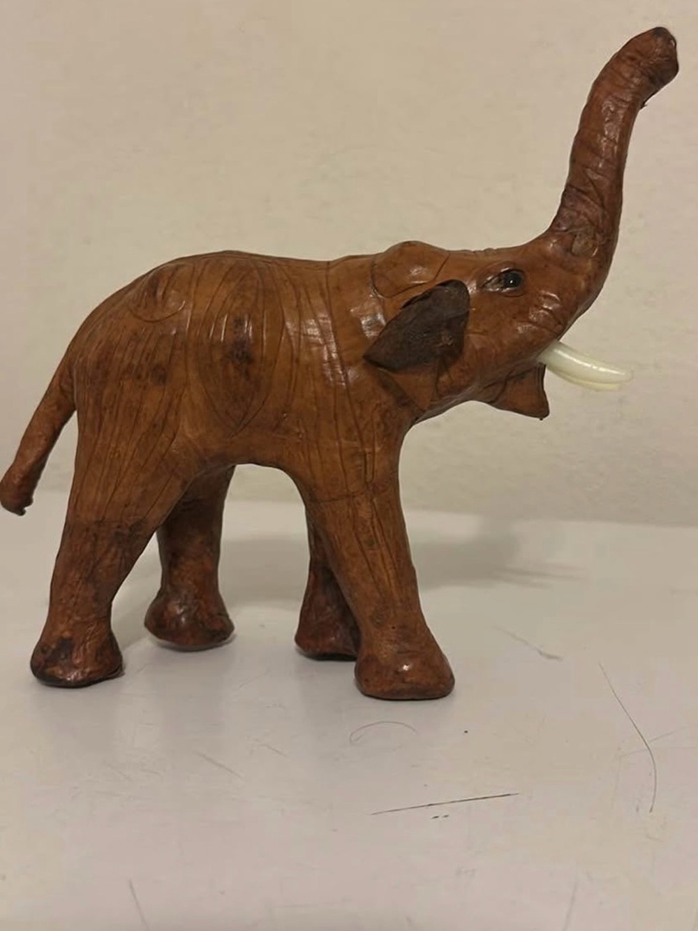 Vintage Leather Wrapped Elephant Figurine with white tusks